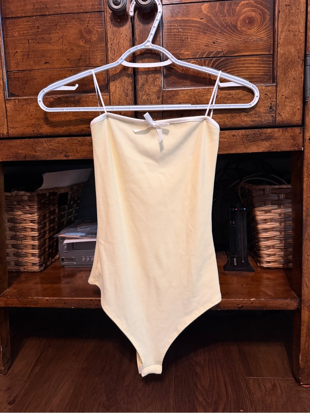 Yellow Ribbed One-Piece Bodysuit with Bow